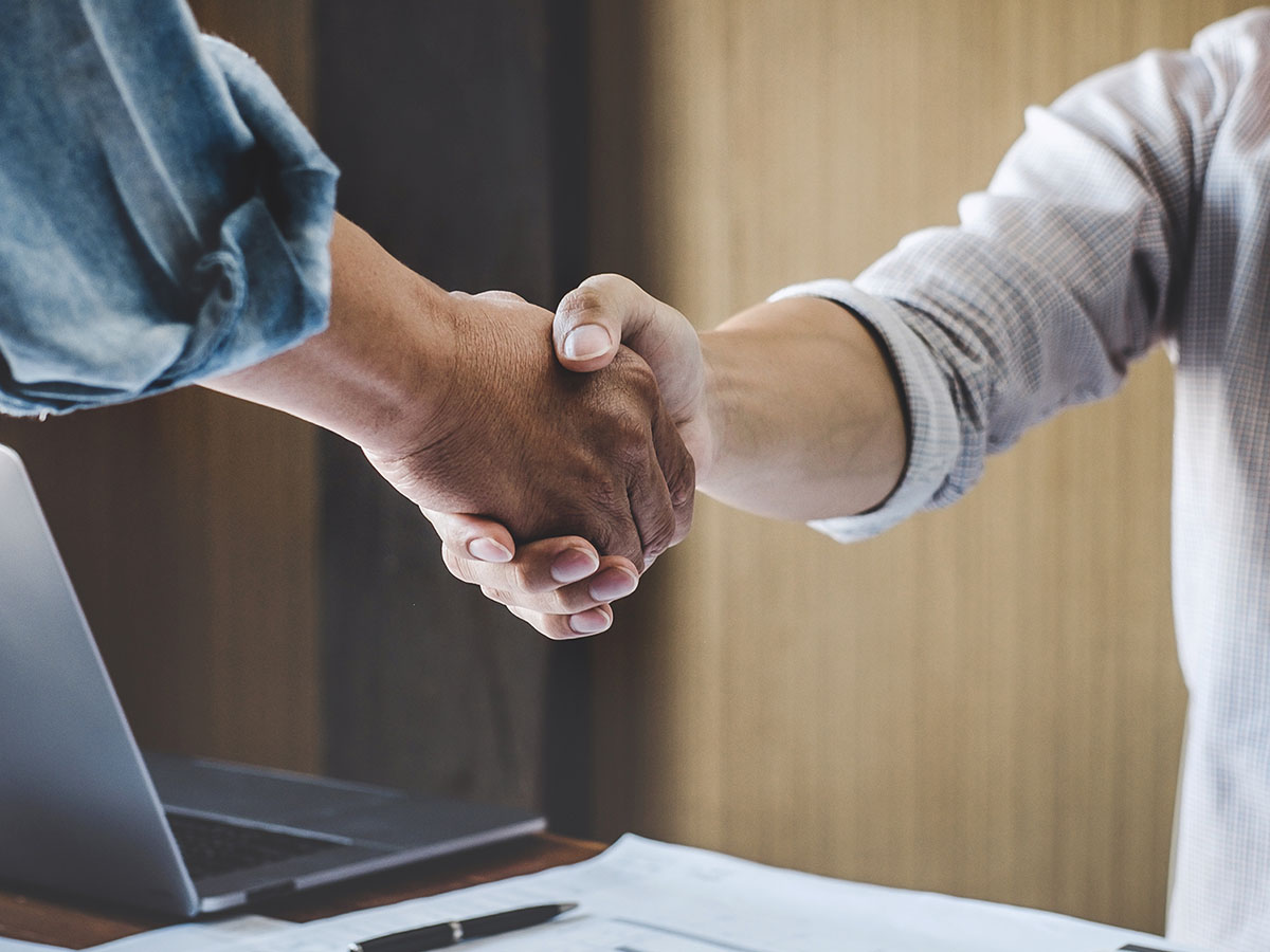 Two men handshake